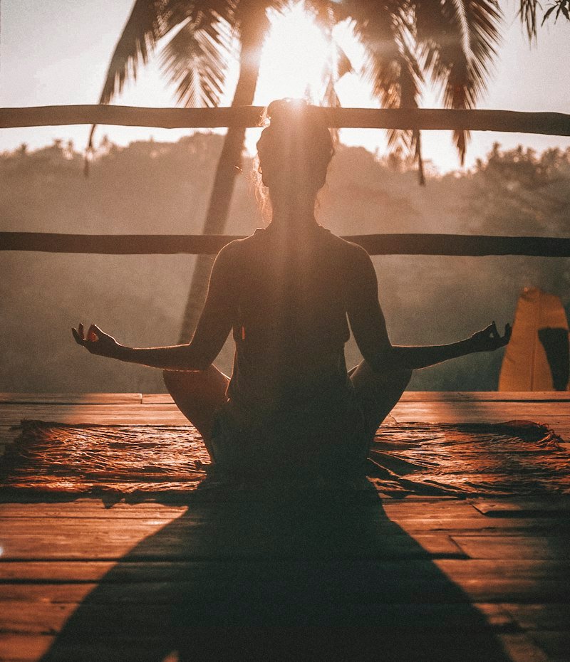 Person practicing breathwork in nature